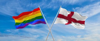 Bulutlu gökyüzünde rüzgarda dalgalanan Igbt ve İngiltere bayrağının çapraz bayrakları. Özgürlük ve aşk kavramı. Gurur ayı. Eylemcilik, toplum ve özgürlük kavramı. Uzayı kopyala 3d illüstrasyon