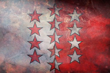 İsviçre 'nin Valais Kantonu' nun grunge desenli retro bayrağının en üst görüntüsü. İsviçre seyahati ve vatanseverlik kavramı. Bayrak direği yok. Uçak tasarımı, tasarım. Bayrak arkaplanı