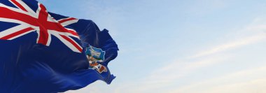 Falkland Adaları 'nın resmi bayrağı bulutlu arka planda, günbatımında, panoramik manzaralı. Vatansever ve seyahat kavramı. Geniş afiş afiş için boşluk kopyala. 3d illüstrasyon