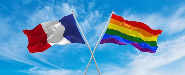 Crossed National Flags France Lgbt Pride Flag Waving Wind Cloudy — Foto Stock