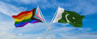 İlerlemenin bayraklarını aştı lgbt gururu ve bulutlu gökyüzünde rüzgarda dalgalanan Pakistan bayrağı. Özgürlük ve aşk kavramı. Gurur ayı. Eylemcilik, toplum ve özgürlük kavramı. Uzayı kopyala 3d illüstrasyon
