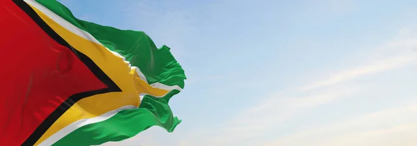 Oficiální Vlajka Guyany Oblačném Pozadí Oblohy Při Západu Slunce Panoramatický — Stock fotografie