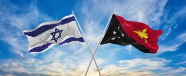 İsrail ve Papua Yeni Gine bayraklarını aşıp bulutlu gökyüzünde rüzgarda dalgalanan bayrak. İlişkiyi, diyaloğu, iki ülke arasında seyahat etmeyi sembolize ediyor. Uzayı kopyala 3d illüstrasyon