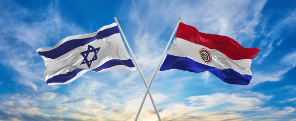 Israelin Paraguayn Kansallisliput Liehuivat Tuulessa Pilvisellä Taivaalla Symboloi Suhdetta Dialogia — kuvapankkivalokuva