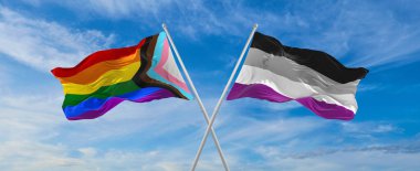 İlerlemenin bayraklarını aştı. Gurur ve aseksüellik. Gurur bayrağı bulutlu gökyüzünde rüzgarda dalgalanıyor. Özgürlük ve aşk kavramı. Gurur ayı. Eylemcilik, toplum ve özgürlük kavramı. Uzayı kopyala 3d illüstrasyon