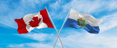 Kanada ve San Marino 'nun ulusal bayraklarını aştı bulutlu gökyüzünde rüzgarda dalgalanan bayrak. İlişkiyi, diyaloğu, iki ülke arasında seyahat etmeyi sembolize ediyor. Uzayı kopyala 3d illüstrasyon