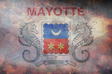 Resmi retro bayrak Mayotte 'nin grunge desenli üst görüntüsü. seyahat ve vatanseverlik kavramı. Bayrak direği yok. Uçak tasarımı, tasarım. Bayrak arkaplanı