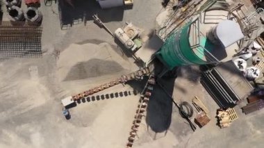 Drone view of huge construction site and concretet fabrication