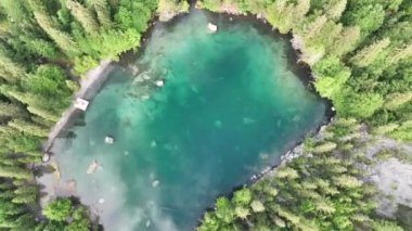 The green lake of Passy Plaine-Joux close to Chamonix in France seen from the sky