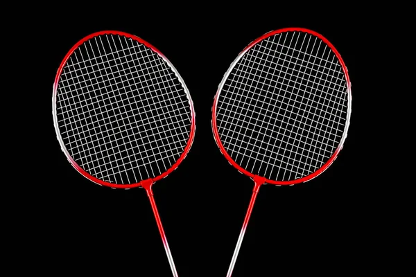 Två Badminton Racketar Isolerade Mot Svart Bakgrund — Stockfoto
