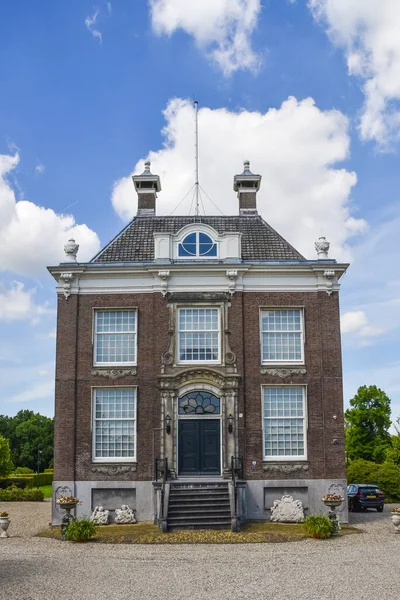 Amsterdam, Netherlands. August 2022. The mansions along the river Amstel near Amsterdam. High quality photo