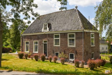 Amsterdam, Netherlands. August 2022. The mansions along the river Amstel near Amsterdam. High quality photo