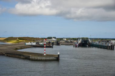 Texel, the Netherlands. August 2022. The ferry port of Texel, as seen from the ferry. High quality photo