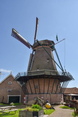 Texel, Netherlands. August 2022. The authenic mill de traanroeier in Oudeschild on the island of texel. High quality photo