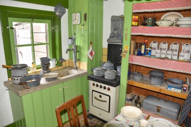 Texel, Netherlands, June 2022. The interior of the old-fashioned kitchen of a poor family. . High quality photo