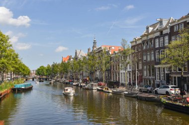 Texel, Netherlands. August 2022. The canals with the houseboats in Amsterdam . High quality photo