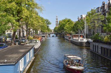 Texel, Netherlands. August 2022. The Prinsengracht with a view of the Westerkerk in Amsterdam. High quality photo