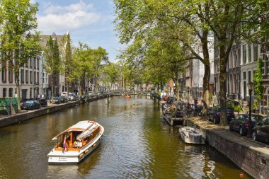 Texel, Netherlands. August 2022. The canals with the houseboats in Amsterdam . High quality photo