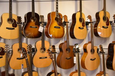 Amsterdam, Netherlands. August 2022. Displayed guitars in a music store. High quality photo
