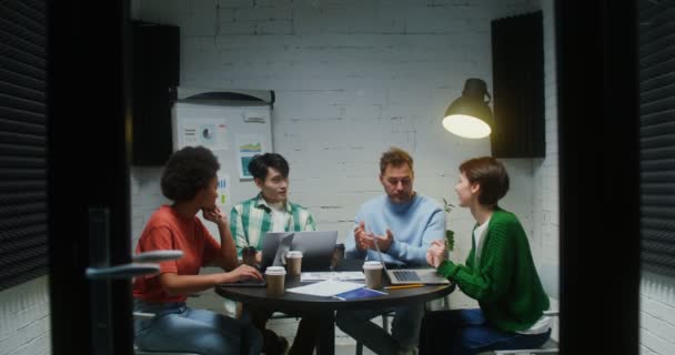 A group of people are talking discussing the creation of a new business — Stock Video