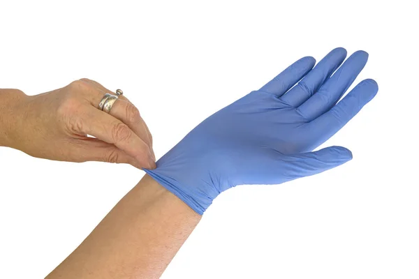 Pracownik Medyczny Umieszczający Niebieską Rękawicę Białym Tle — Zdjęcie stockowe