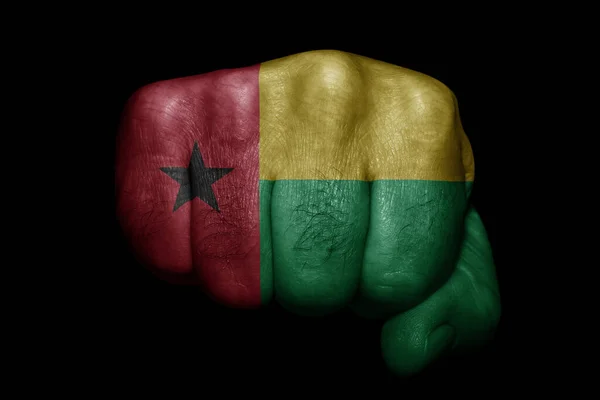 Flagge Von Guinea Bissau Auf Starker Faust Auf Schwarzem Hintergrund — Stockfoto