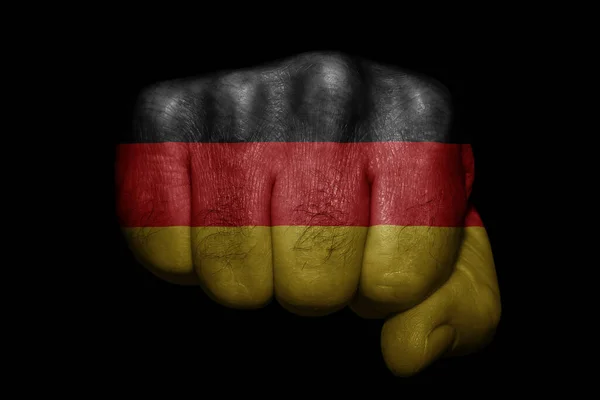 Bandera Alemania Pintada Sobre Puño Fuerte Sobre Fondo Negro Imagen De Stock