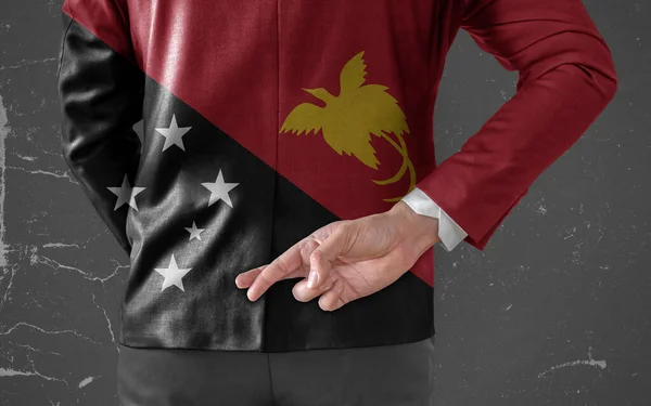 Kurtka Biznesmena Flagą Papui Nowej Gwinei Kciukami Plecami — Zdjęcie stockowe