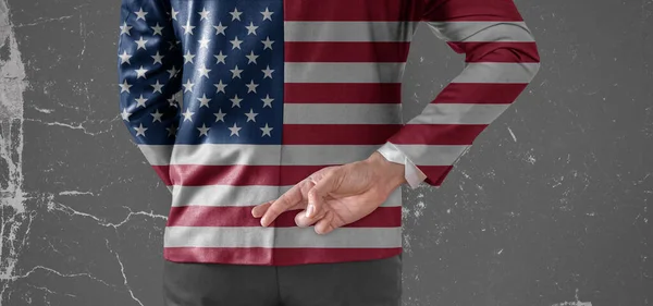 Jacket Flag of America on Businessman with his fingers crossed behind his back
