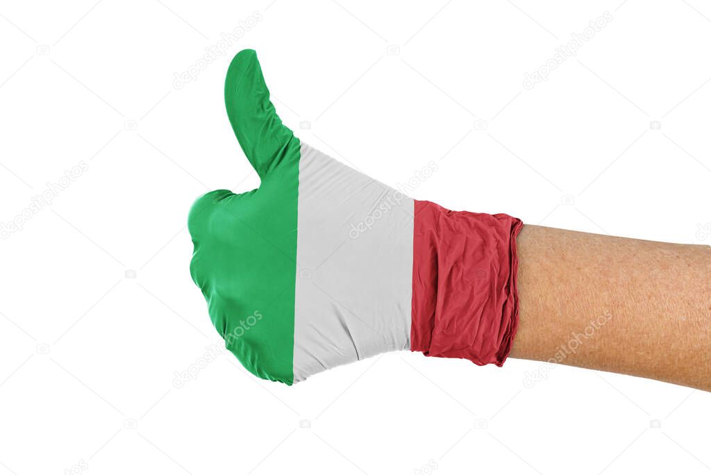 Italy flag on a medical glove showing thumbs up sign