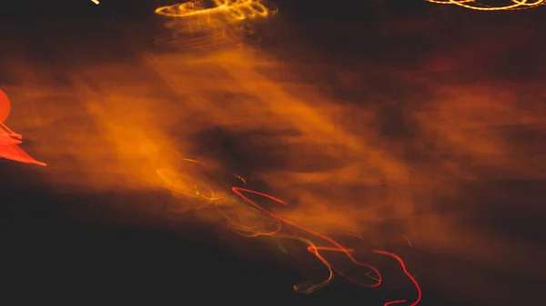 Fond Sombre Avec Des Lueurs Jaunes Orange Comme Des Néons — Photo