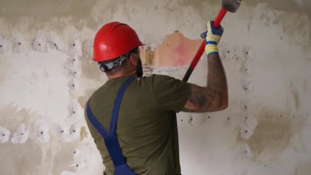 Man Doing Manual Dismantling Demolition Works Big Hammer Hits Apartment — Stock Video