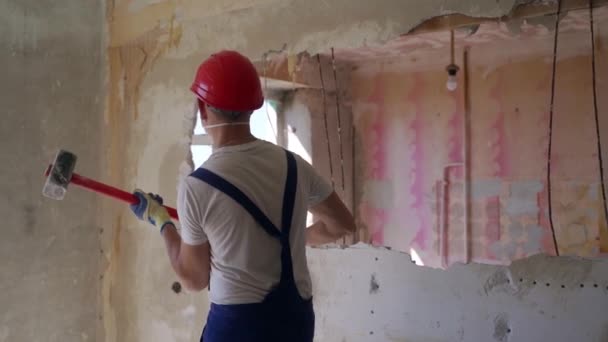 Contractor Wrecks Wall Sledgehammer Making Hole Rearrangement Construction Worker Doing — Stock Video