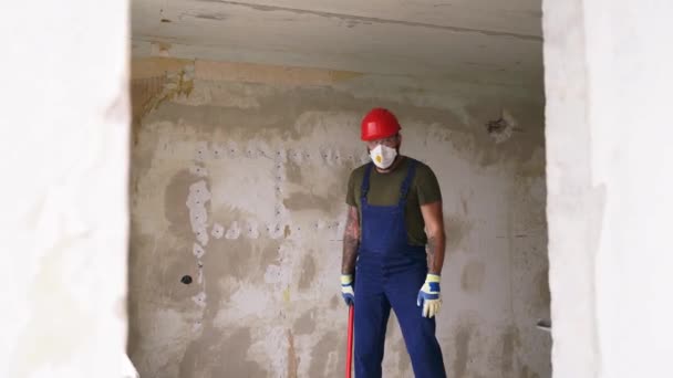 Contractor Standing Raising Sledgehammer Shoulder Apartment Rearrangement Demolition Work Construction — Stock Video