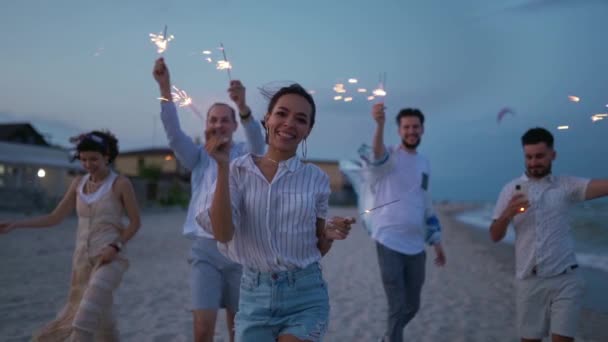 Multiethnic Friends Walking Dancing Having Fun Night Party Seaside Sparklers — Stock Video