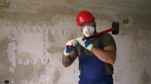 Contractor Standing Raising Sledgehammer Shoulder Apartment Rearrangement Demolition Work Construction — Stock Video