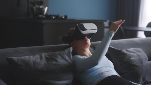 Woman Virtual Reality Googles Enters Metaverse Controls Immersive Expirience Hand — Vídeo de stock