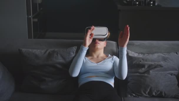 Woman Virtual Reality Googles Enters Metaverse Controls Immersive Expirience Hand — Vídeo de Stock