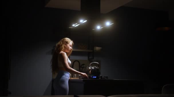 Young Woman Kitchen Puts Kettle Stove Girl Turns Gas Just — Αρχείο Βίντεο