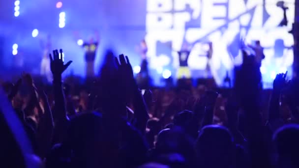 People Waving Hands Silhouettes Taking Photos Recording Videos Live Music — Stock video