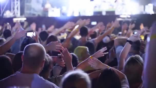 People Waving Hands Silhouettes Taking Photos Recording Videos Live Music — Stock video