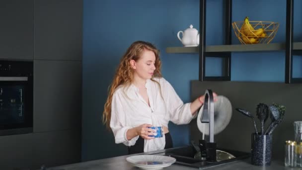 Authentic Happy Caucasian Woman Washing Dishes Dancing Modern Kitchen Young — Stock Video