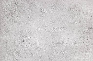 Duvarda pürüzlü beyaz alçı dokusu, yatay.