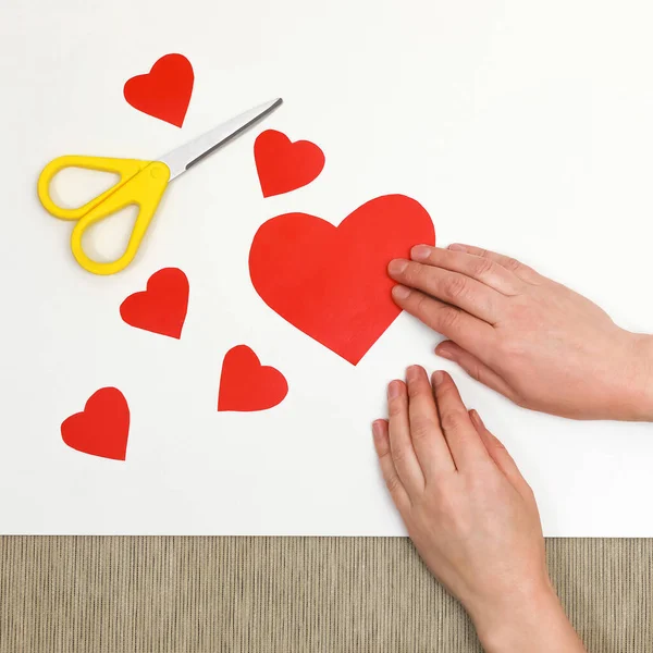 Square Composition Female Hand Holding Heart Cut Red Paper Scissors — Stock Photo, Image