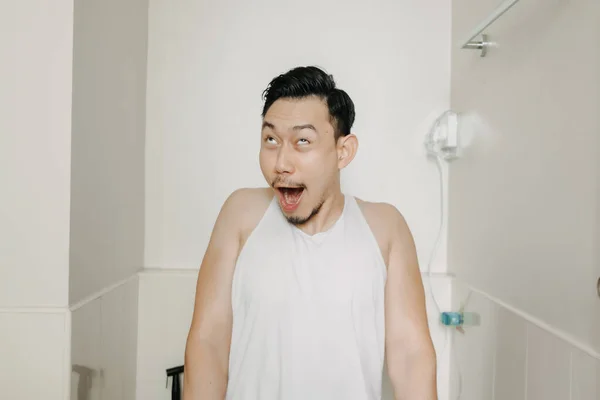 Funny face expression of man try to poop in the toilet. — Stock Photo, Image
