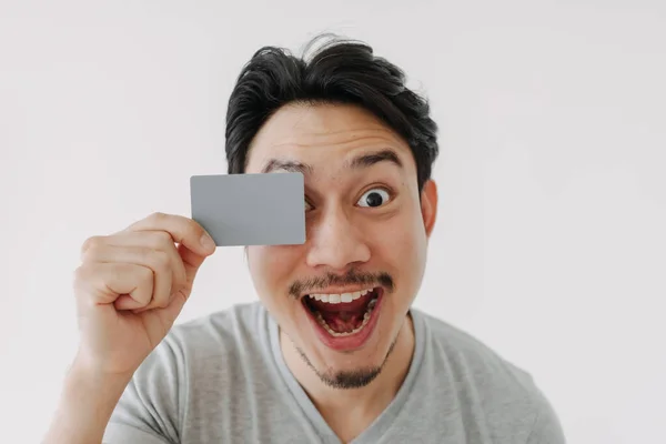 Happy funny face man show off his empty card on white background. — Stock Photo, Image
