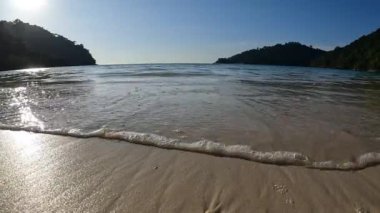 Wave and beach in Mu Ko Surin national park, Phang-Nga, Thailand.
