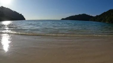 Wave and beach in the island of Mu Ko Surin national park, Phang-Nga, Thailand.