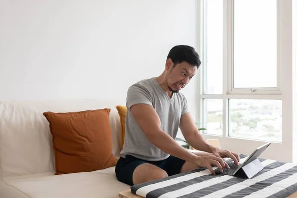 Angry Furious Asian Trader Man Working Tablet Laptop His Apartment — Stok Foto