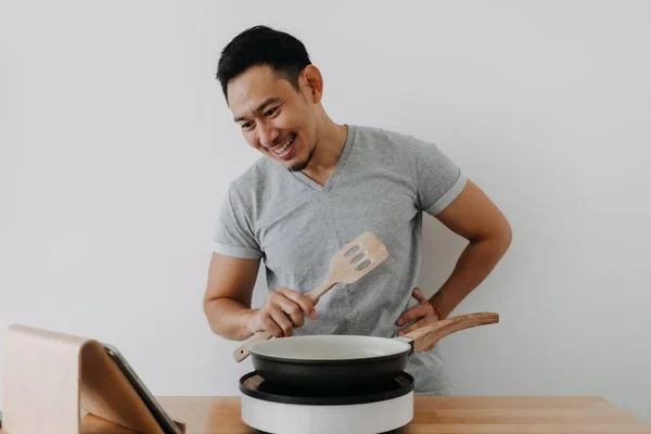 Happy Asian Man Cooking Online Tutorial Tablet Isolated White Background — Stok Foto